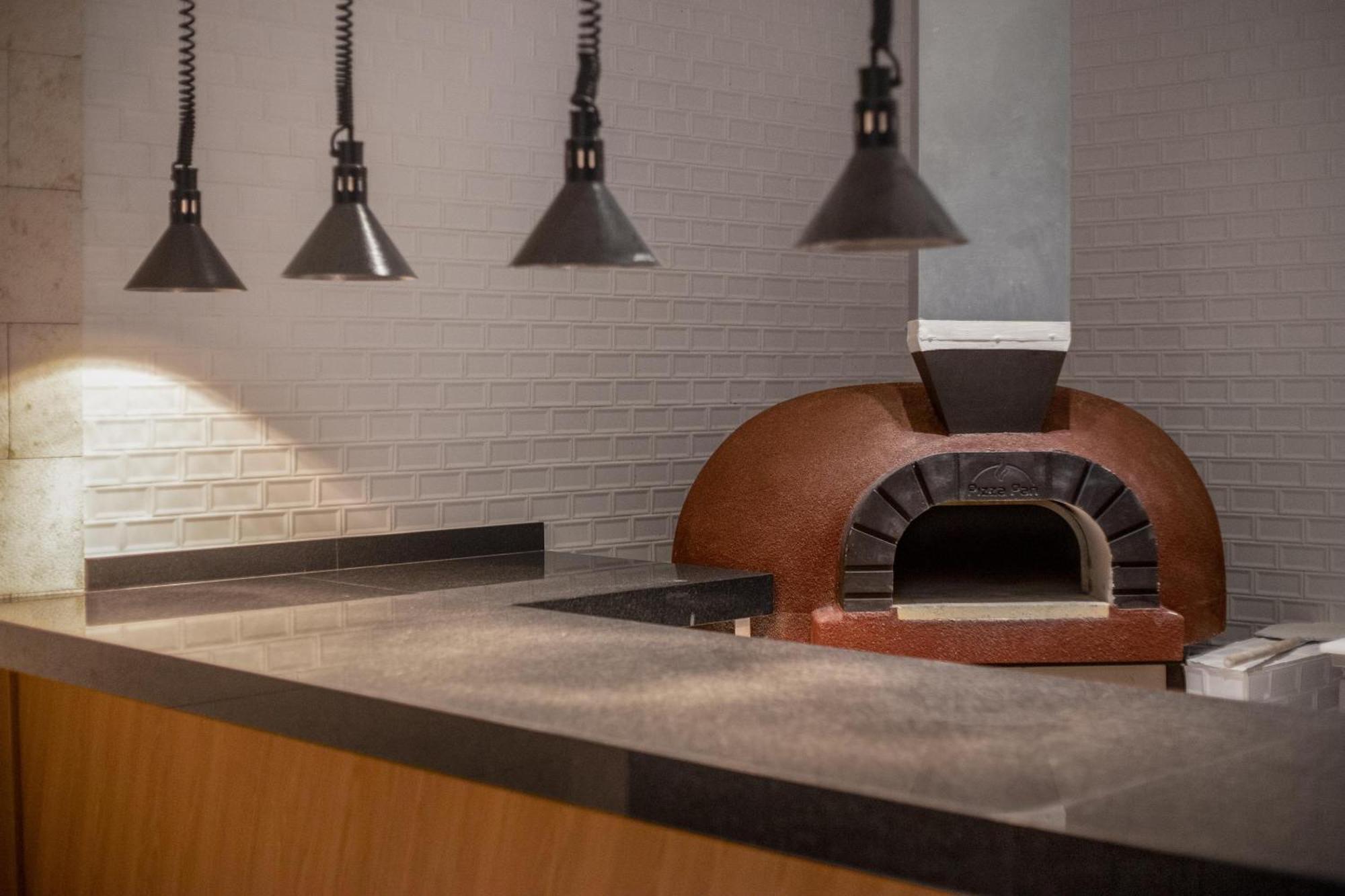 Serenade Punta Cana Beach & Spa Resort Exterior foto Wood-burning brick oven